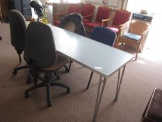 4 x assorted chairs with folding table. Located at main school
