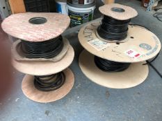 Four used reels of electrical wire