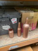 Two boxes containing various glass bottles & jars painted copper colour