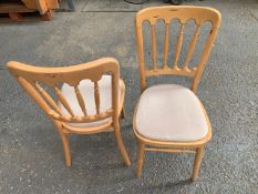 Twenty Eight wooden framed dinning chairs with Velcro fitted cloth cushions