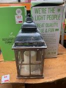 Two battery operated distressed wooden candle lanterns