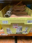 Two boxes of wooden hangers c/w two cloths rails