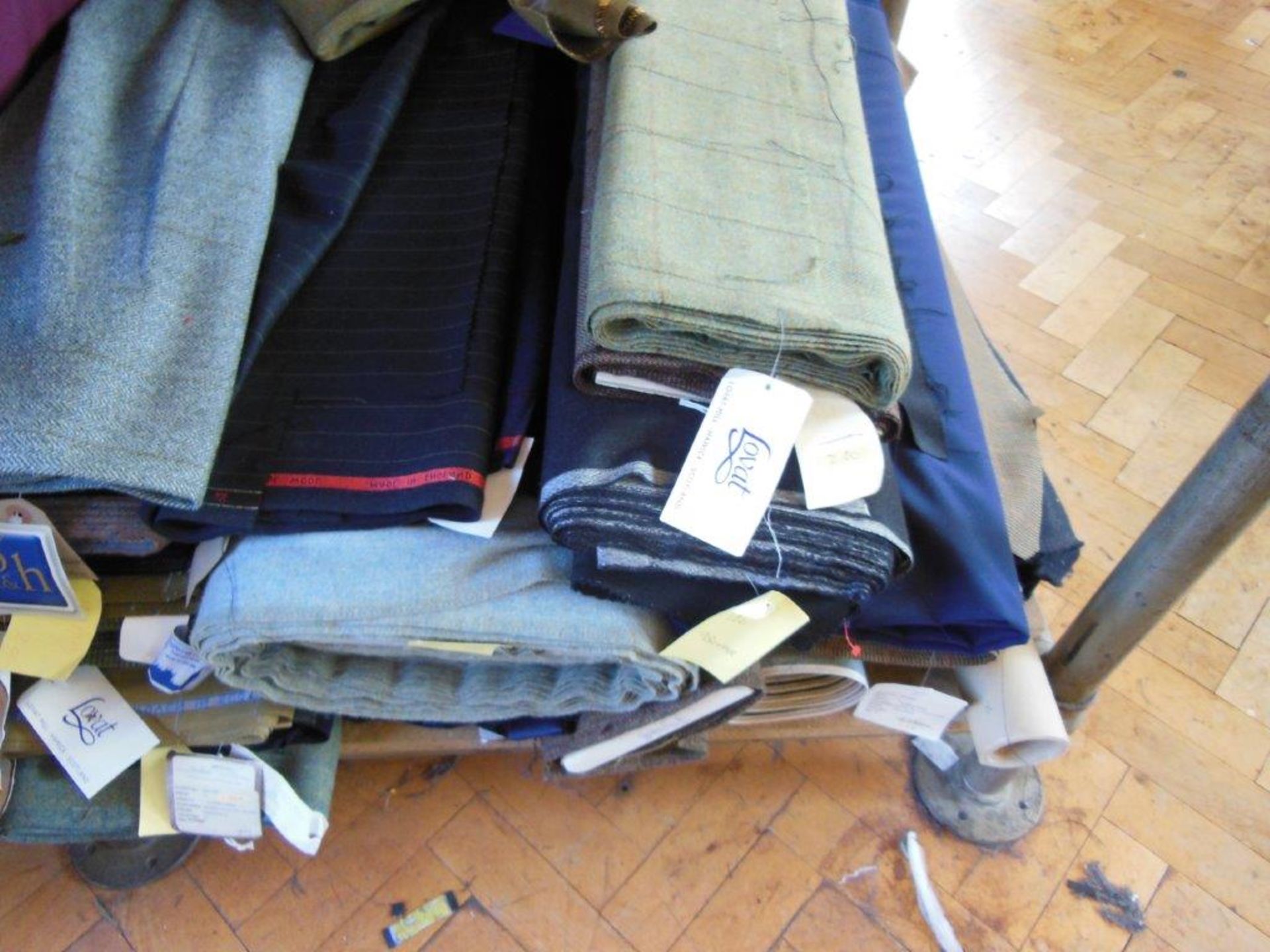 Large quantity of assorted fabrics including tweed, wool and cotton, in 3 bay steel keyway rack - Image 4 of 6