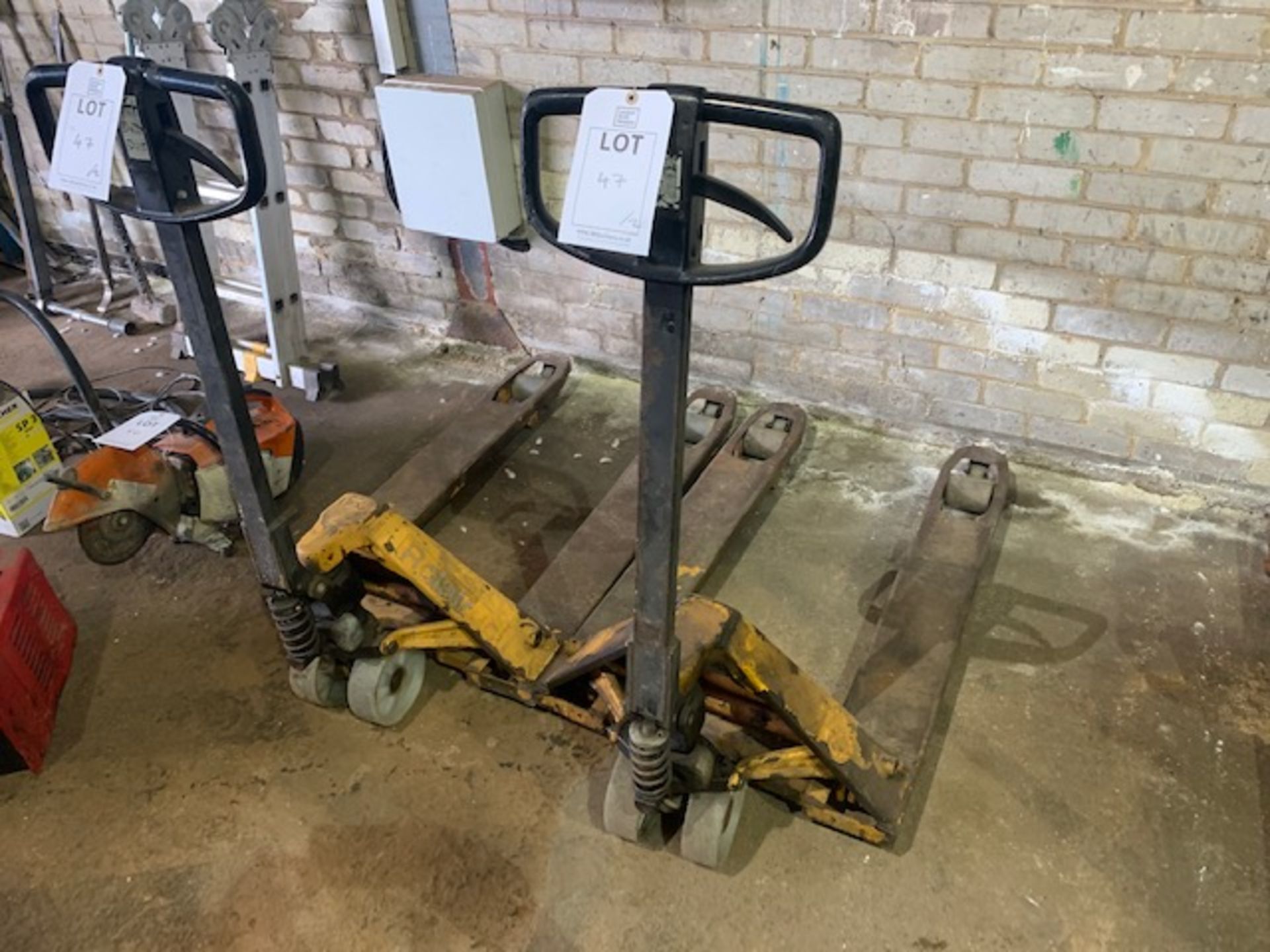 Two Rolatruck wide pallet trucks