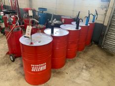 Five part used 200l barrels of oil with manual pumps oil to include 5/40, 10/50, 0/30 & SW40