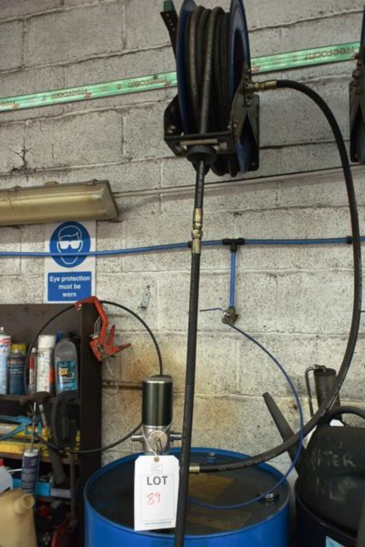 Pneumatic fuel/oil pump with digital dispensing unit and wall mounted fuel hose reel Please Note: