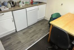 Unbadged dishwasher and undercounter fridge, pine effect rectangular table and three chairs