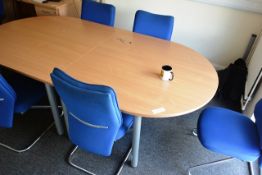 Light oak effect oval boardroom table, 2 piece, and six blue cloth upholstered chairs