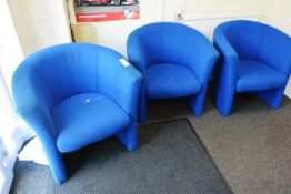 Three blue cloth upholstered tub chairs and light oak effect side units