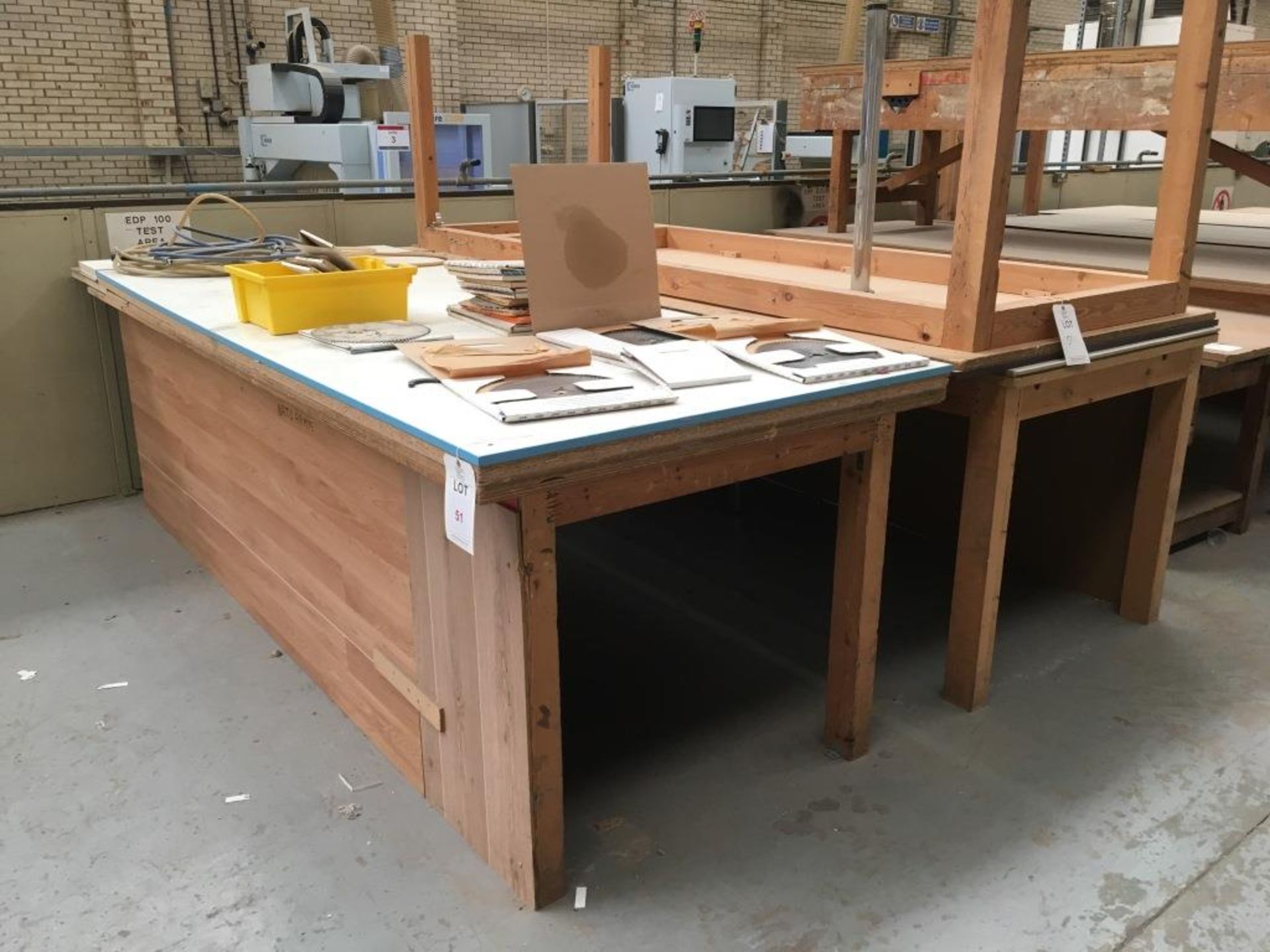 Three wooden works benches (contents not included)