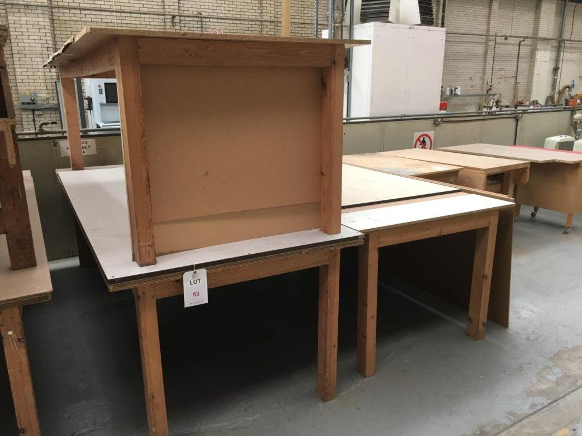 Three wooden works benches (contents not included)