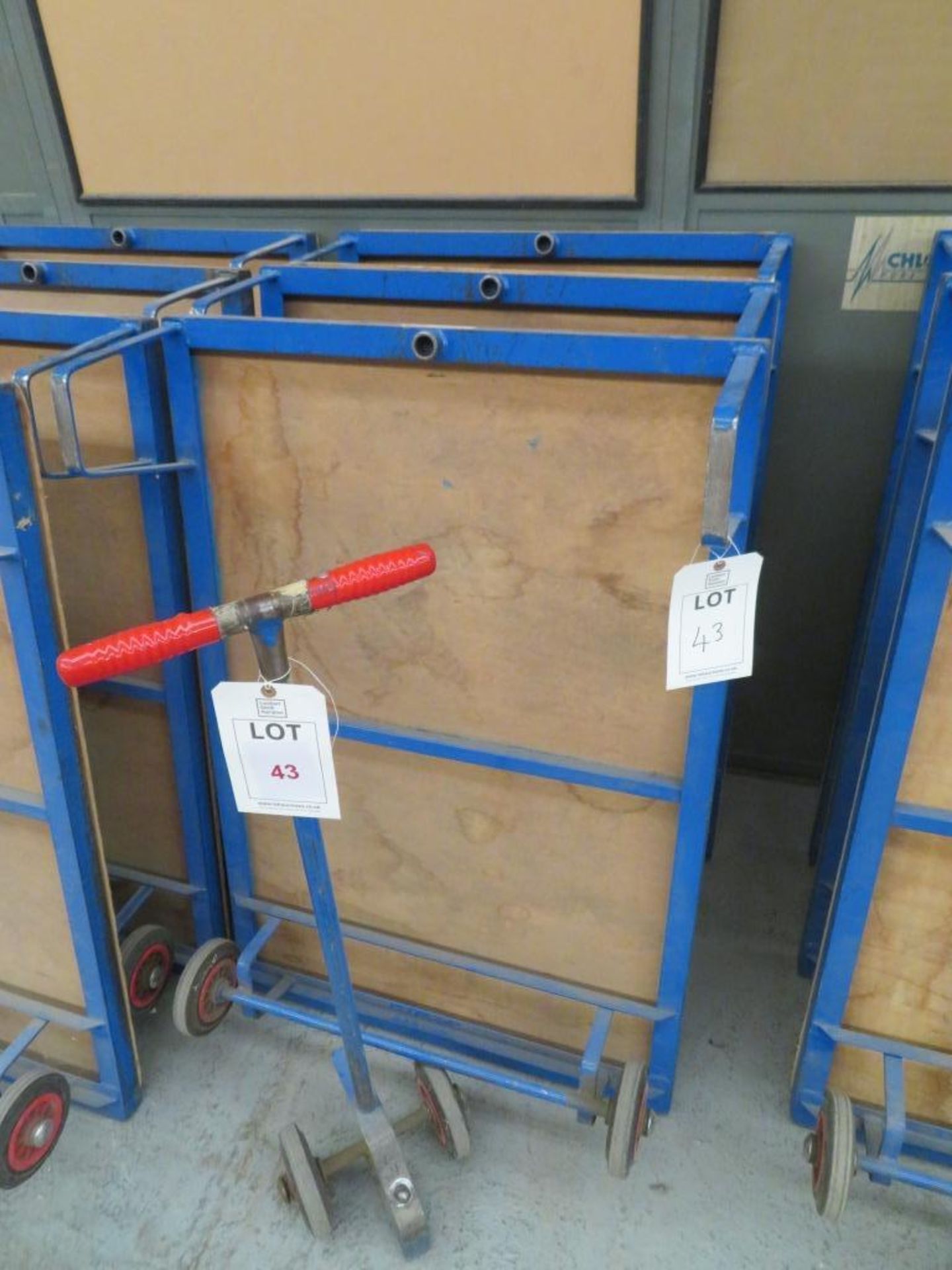 Three flat bed work trolleys with one handle