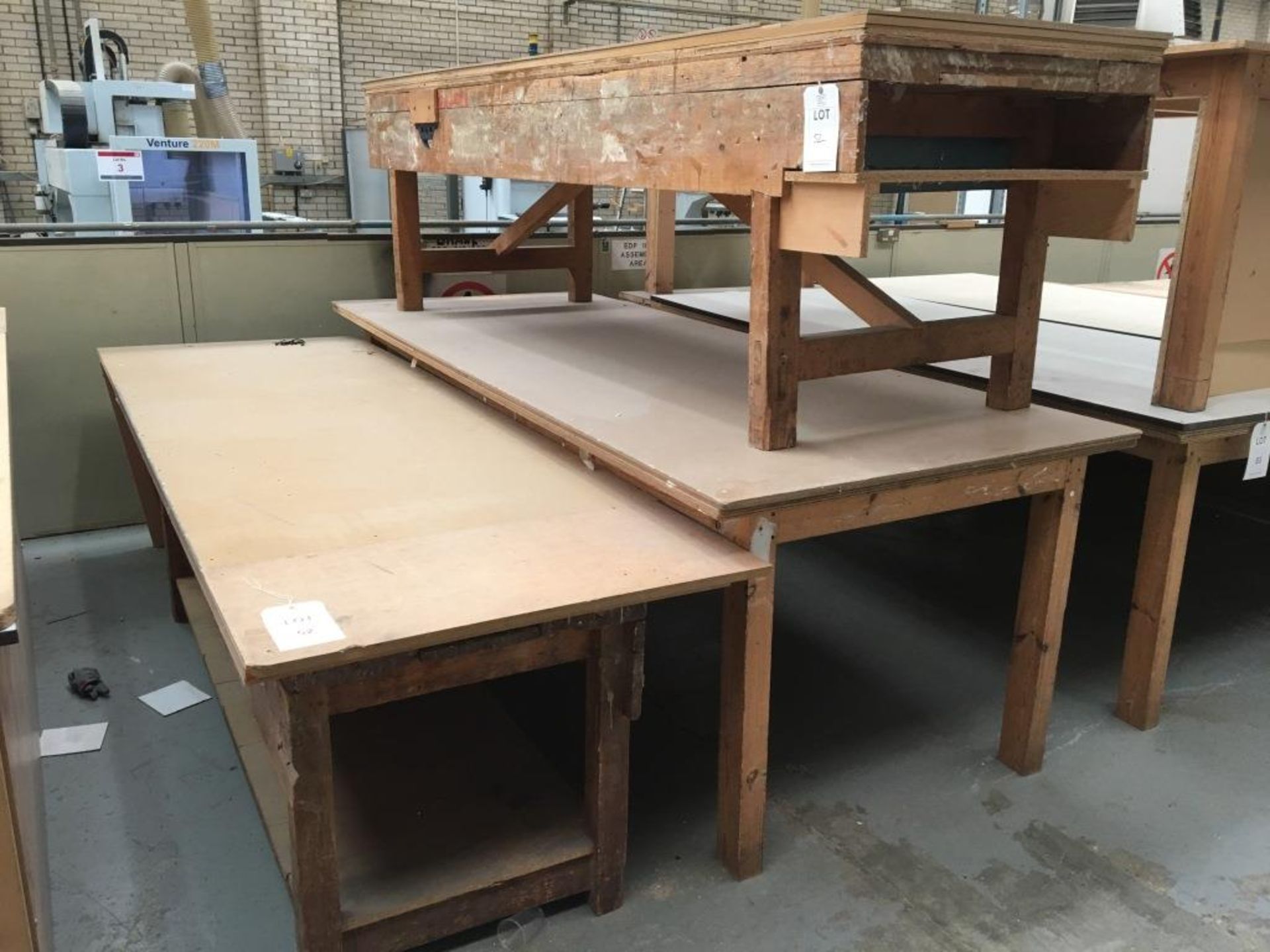 Three wooden works benches (contents not included)