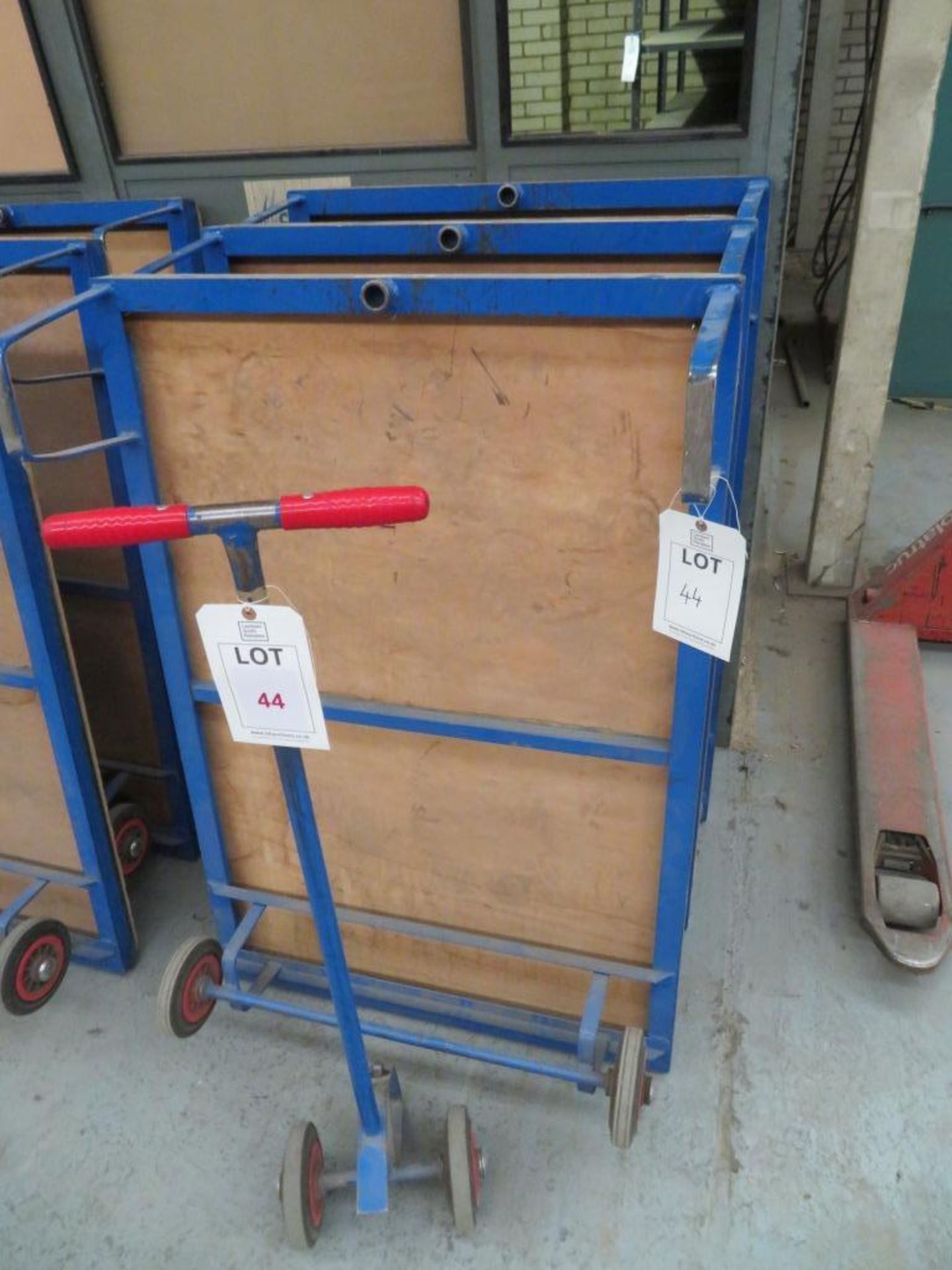 Three flat bed work trolleys with one handle