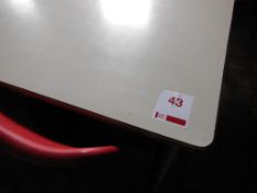 Laminate topped canteen table and 11 red polypropylene stacking chairs, contents of cupboards
