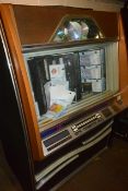 Two various out of commission juke boxes (sold as spares/repairs only), including Rowe Ami Compact