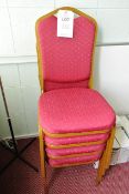 Four steel frame, red cloth upholstered stacking chairs