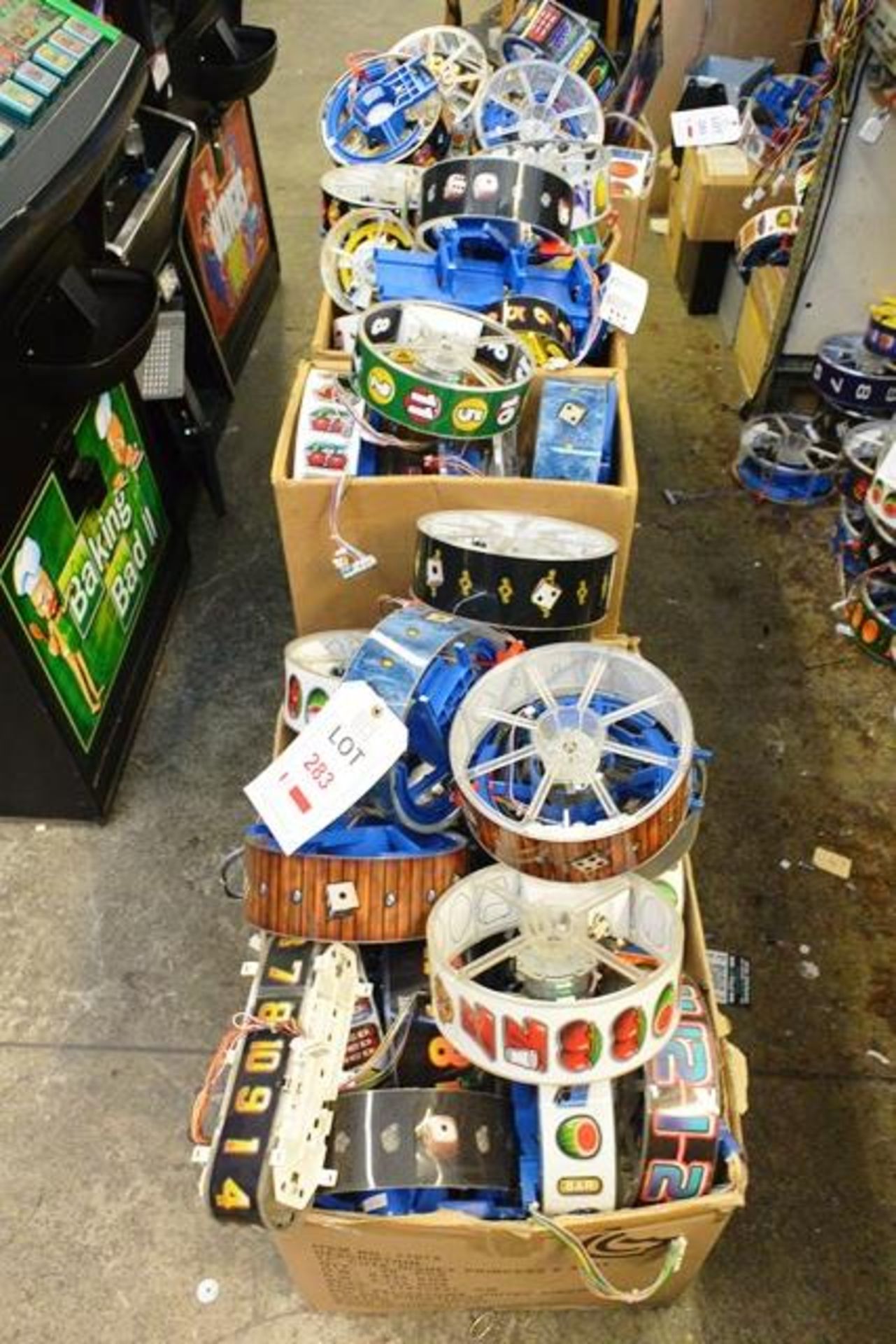 Five boxes of various fruit/AWP machine wheels (as lotted)