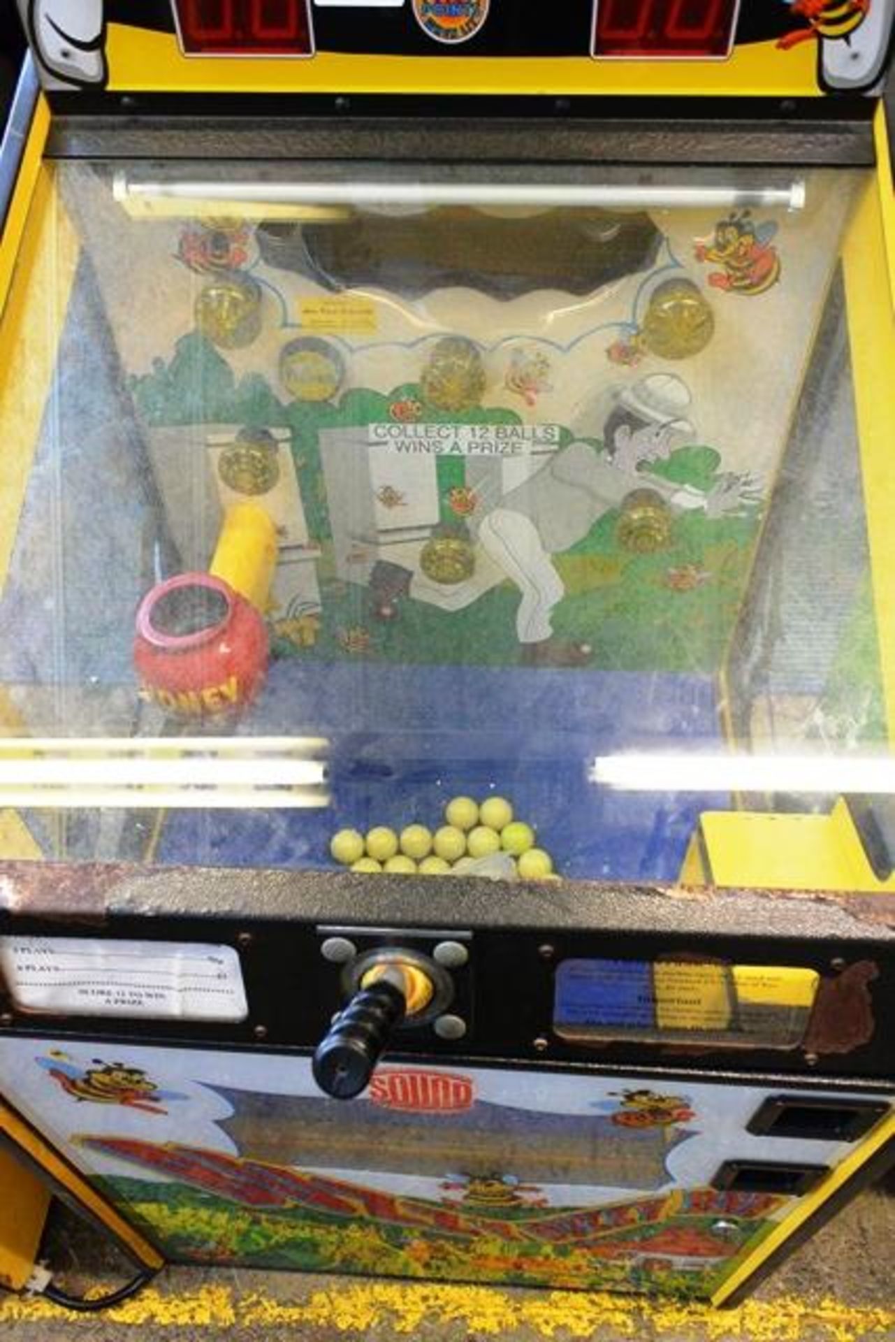 Sound Leisure Systems "Buzzy Buzzy Bee" pay to play machine, with associated prize dispenser ( - Image 3 of 4