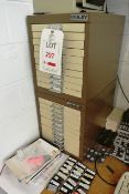 Two Bisley 10 tray drawer cabinets and contents, to include various amusement machine chips