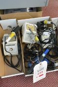Two boxes and contents to include four various 240v soldering stations (working condition unknown)