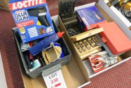 Two boxes and contents to include various drill bits, router bits, Hexley wrench set, hole saws,