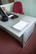 Grey laminate 5 drawer desk and red cloth upholstered swivel chair