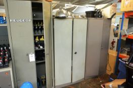 Three various steel 2-door storage cabinets (excludes contents) (please note: this lot cannot be