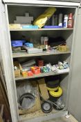 Steel 4 shelf twin door storage cabinet and contents to include various bulbs, tools, rubber wheels,