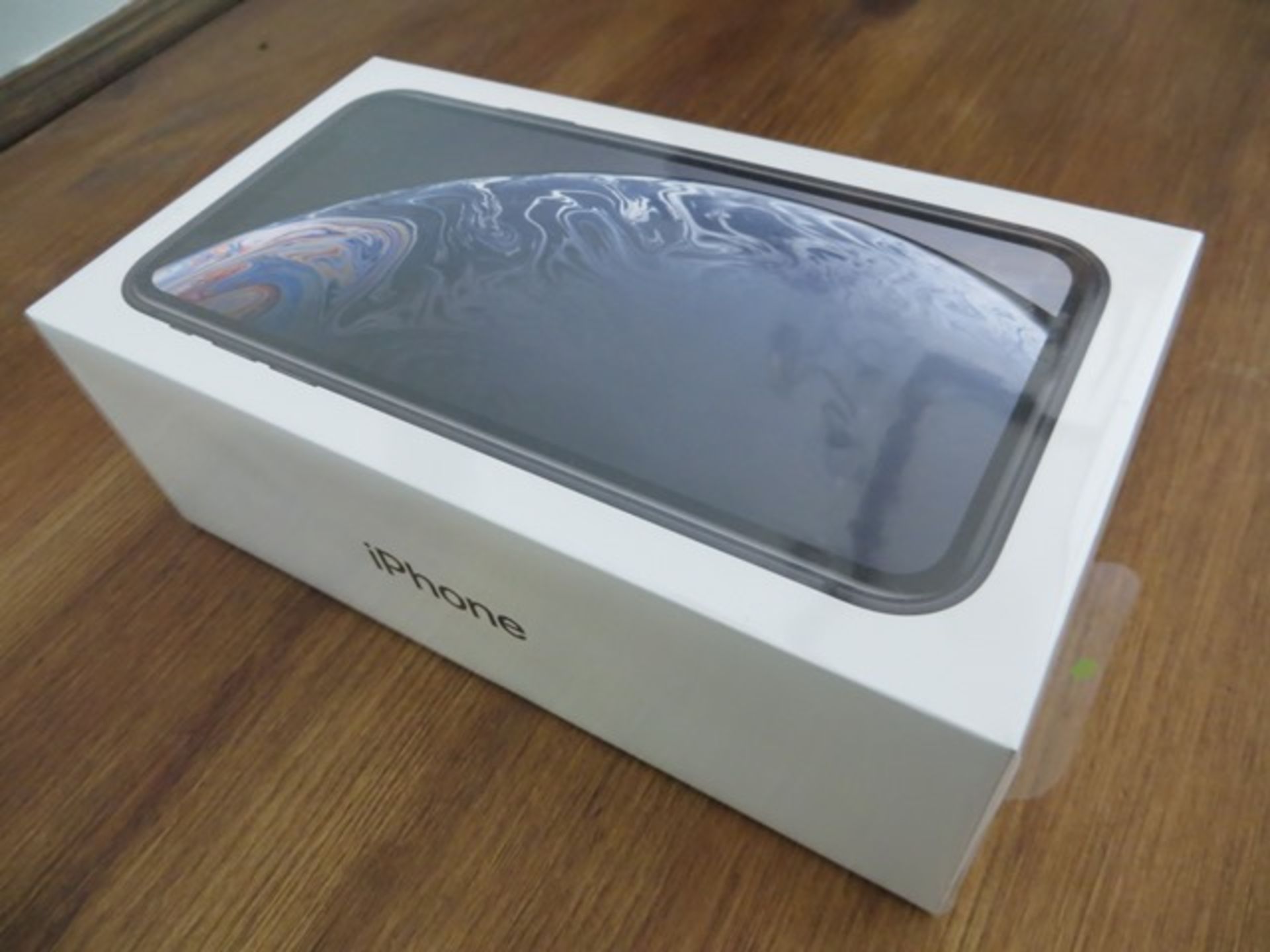 Apple iPhone XR Black 64Gb Unused unopened & boxed in original cellophane to include Earpods with