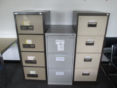 2 - Four drawer filing cabinets and 1 - three drawer filing cabinet