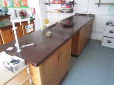 Wood laboratory workbench with 2 double/1 single under storage, water and gas taps, sink, power