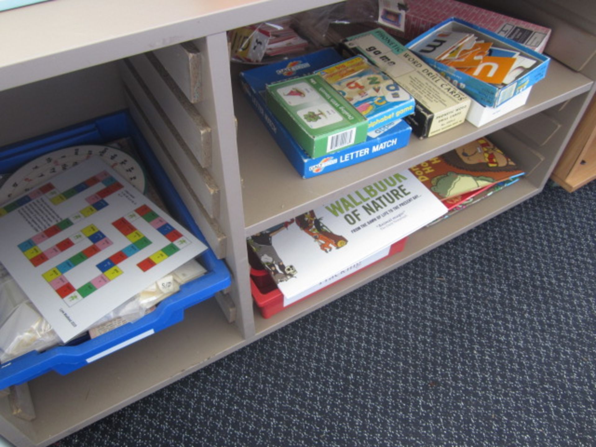 2 x storage units with contents including games, teaching aids etc., table, chair,Located at main - Image 3 of 5