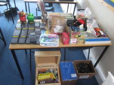 Assorted sundries including pencils, pens, calculators, school exercise books, rulers, headsets,