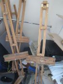 Contents of cupboard including 4 x wood frame artist easels, bespoke notice boards etc.,Located at