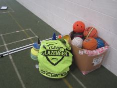 Quantity of assorted basket balls, soft balls, footballs, posts, etc.,Located at main school,**