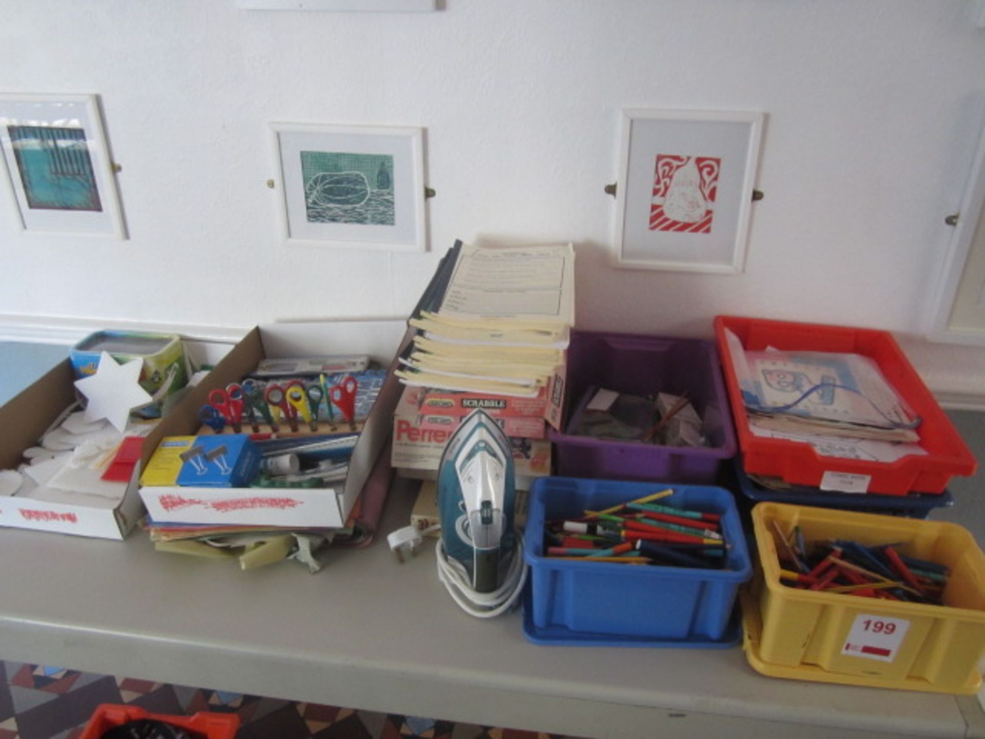 Quantity of assorted plastic storage boxes, teaching aids, pens, board games, etc.,Located at main