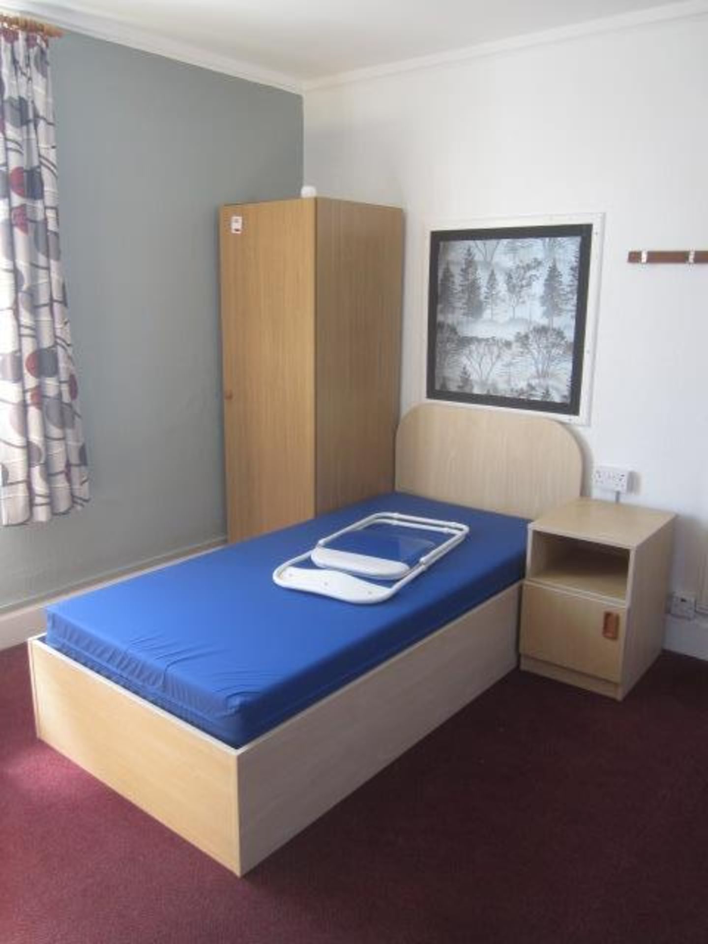 Lightwood effect bedroom suite comprising single bed with under storage drawer, single wardrobe,