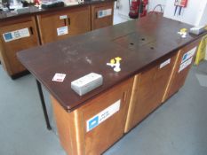 Wood laboratory workbench with 2 double/1 single under storage, water and gas taps, sink, power