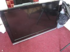 Sony Bravia 40" flat screen TV, 3 shelf glass TV stand,Located at main school,** Located at Shapwick