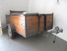 Metal frame and timber slatted single axle trailer, approx. dimensions: 1.8m x 1.3m with fitted