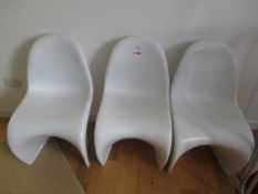 Three plastic designer static chairs