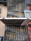 Three carry cases of assorted drill bits