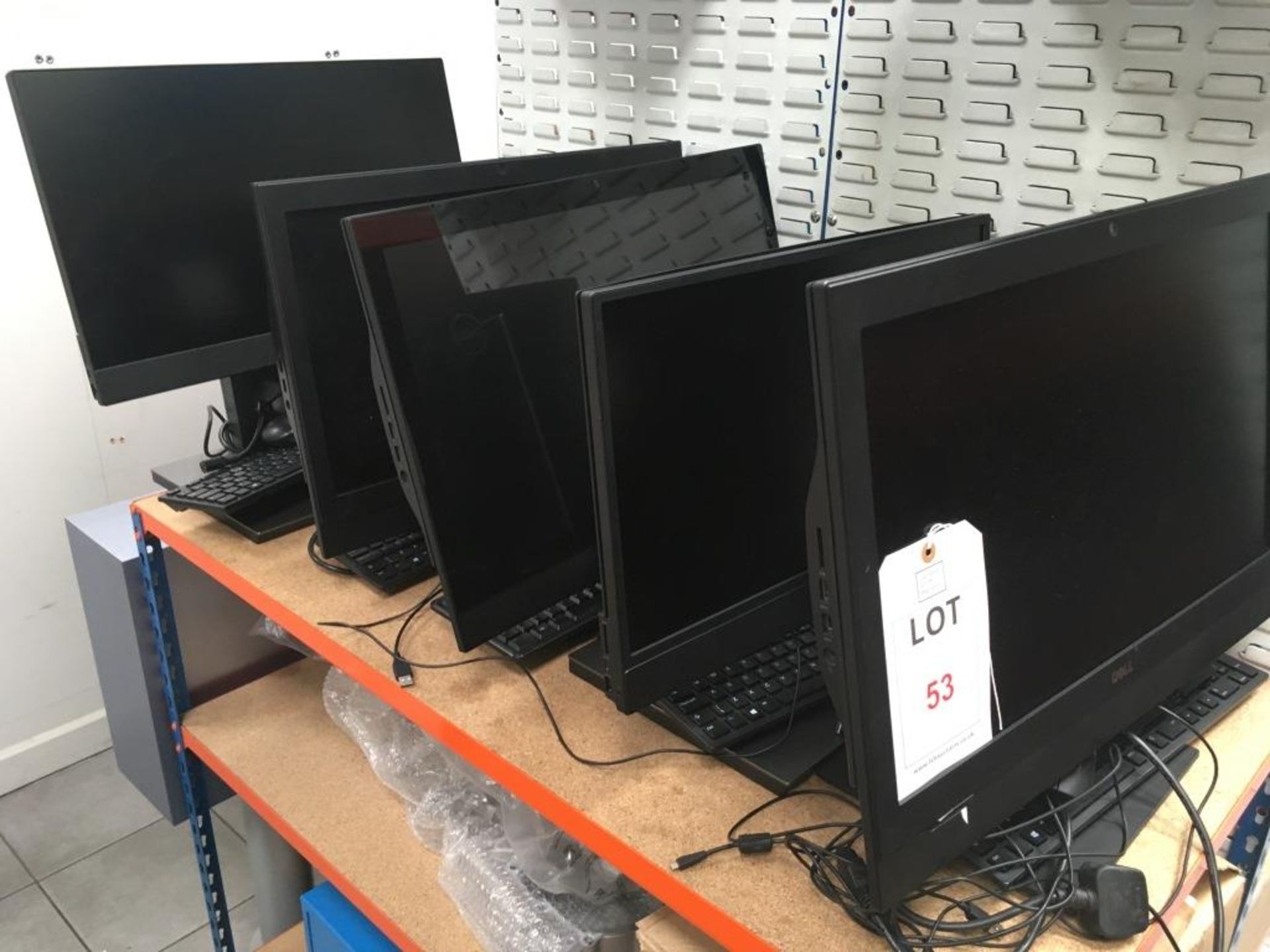 Five Dell all in one computers each with keyboard and mouse (hard disc drives have been removed)