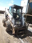 Bobcat S650 compact skid steer, s/n: A3NW11142 (2010) with forks, White road sweeper attachment,