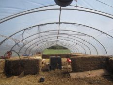 Galvanised poly tunnel frame, approx. 30m x 10m with pulley system feed stations - covered.**A