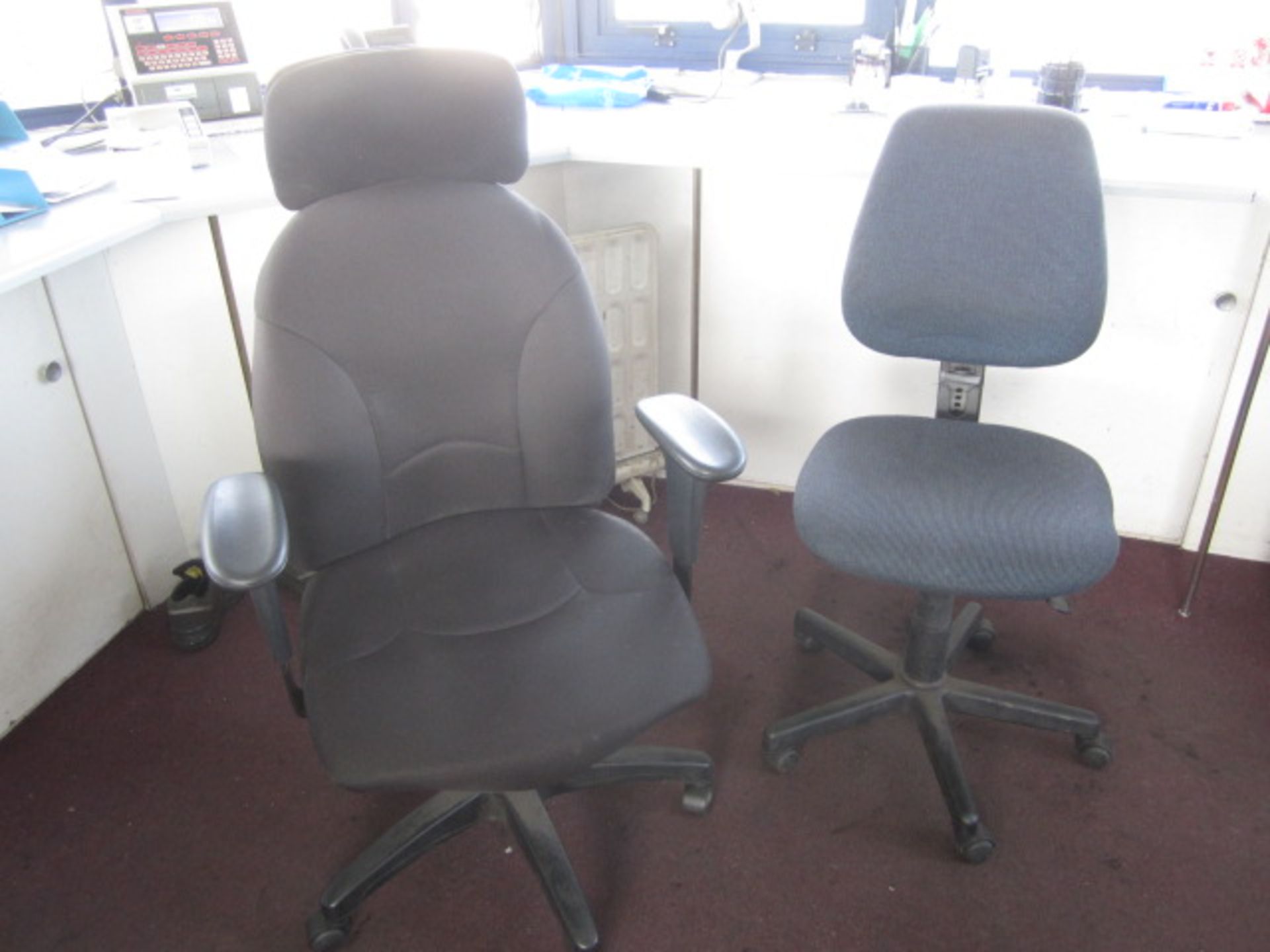 Two upholstered swivel chairs, two vinyl meeting chairs, mobile electric radiator