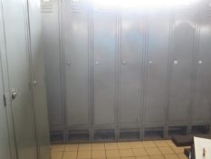 Twelve metal single door personal lockers