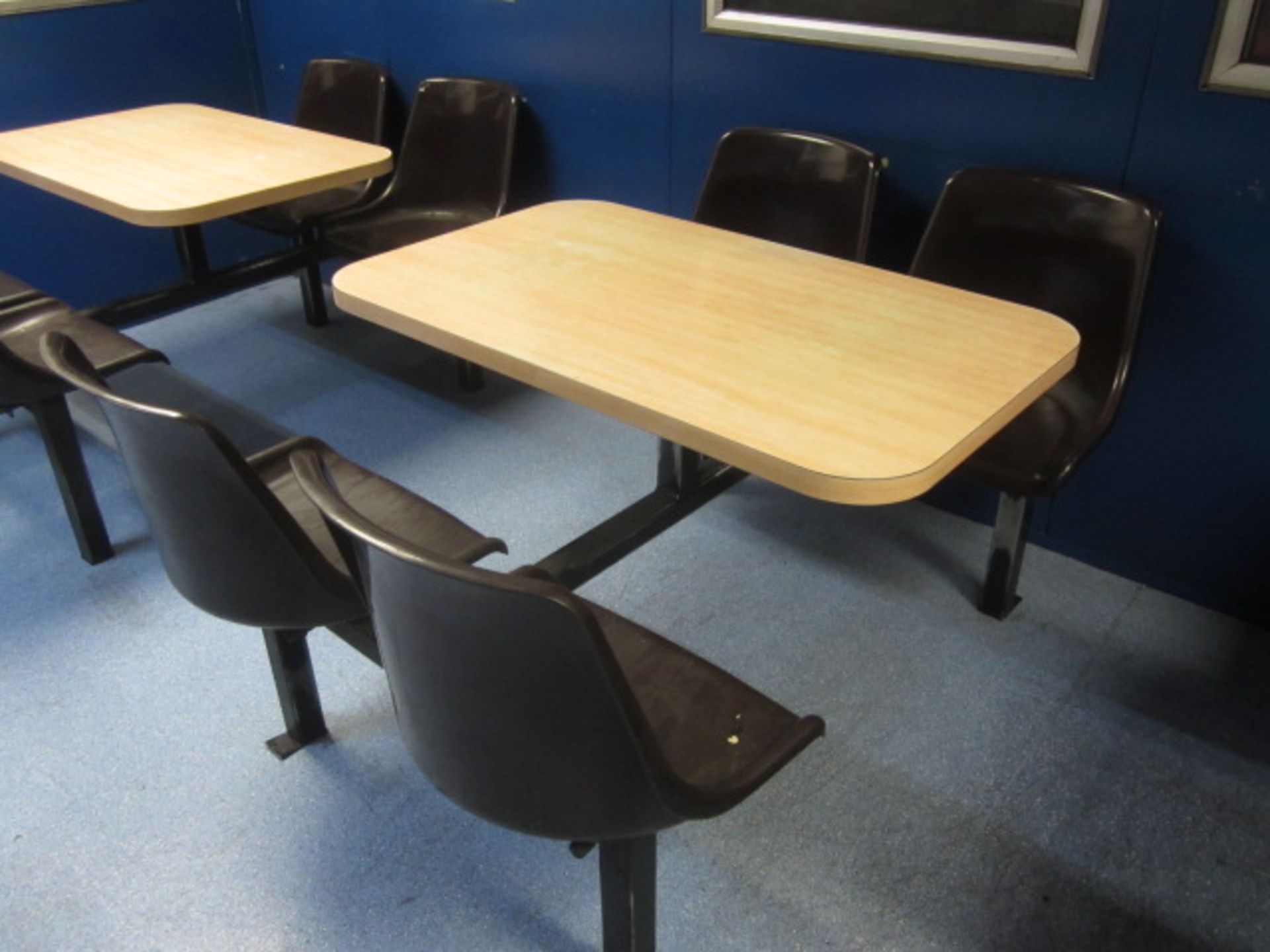 Two wood effect canteen tables with four fixed seats - Image 2 of 2