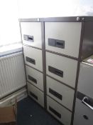 Two metal 4 drawer filing cabinets, and metal 2 door storage unit